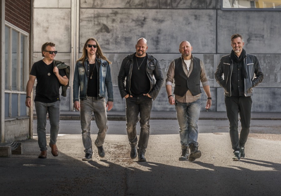 Arctic Rain – the five members walking towards the camera
